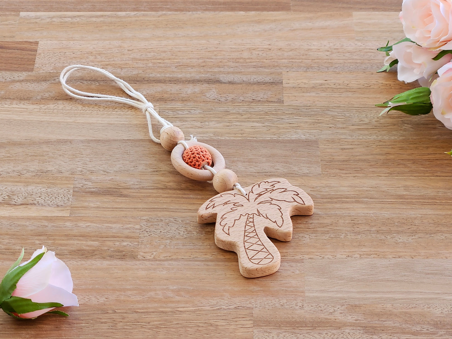 Beaded hanging toy with wooden palm tree