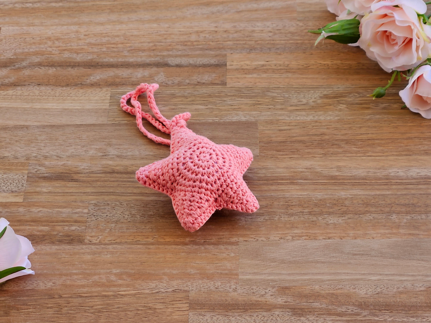 Crochet pink star hanging toy