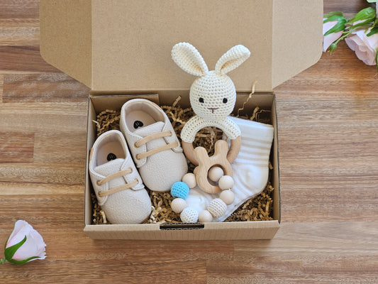 Baby gift box includes, Beige lace up shoe, Bunny rabbit rattle, beaded teether toy ring and stripped socks