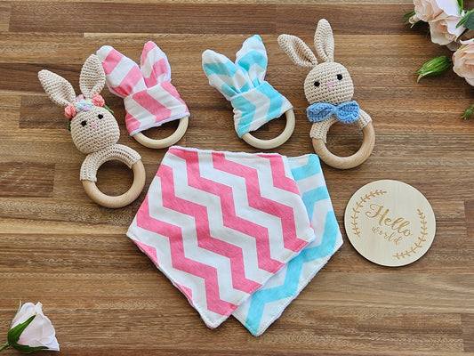 Twin baby boy girl gift box includes 2 bunny rabbit rattles, 2bunny ear teether rings, 2 bandana bibs and a hello world announcement disc