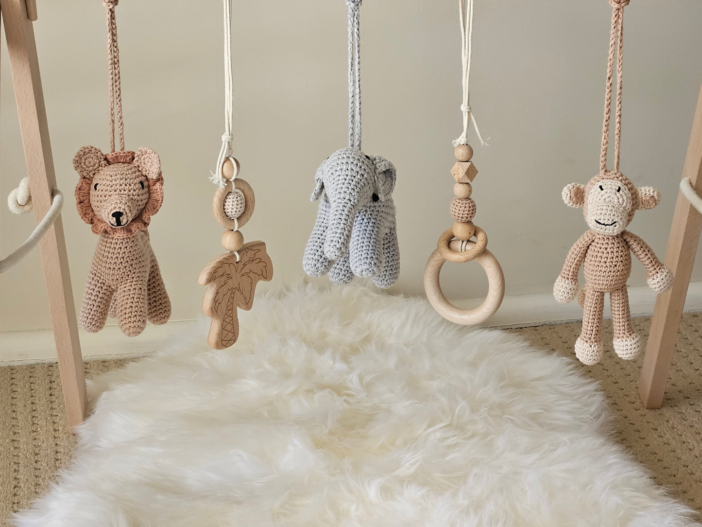 Wooden baby gym frame with Crochet Monkey, crochet brown lion, crochet grey elephant, 2 wooden hanging toys