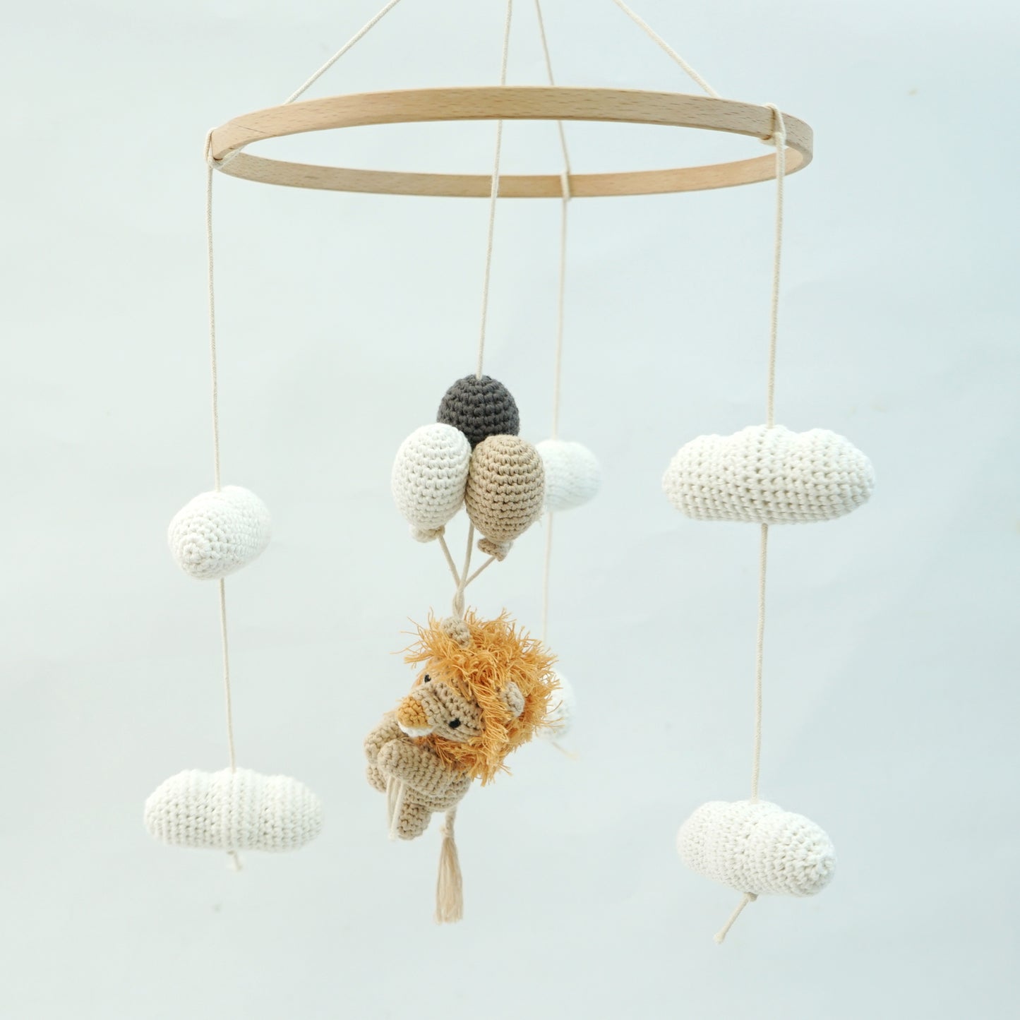 Crocheted Lion hanging mobile with cream  clouds and cream, beige and dark grey crocheted balloons