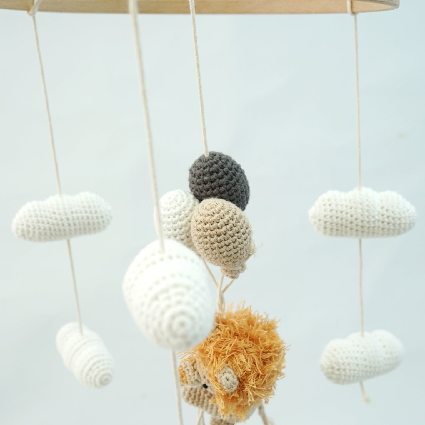 Crocheted balloons and clouds