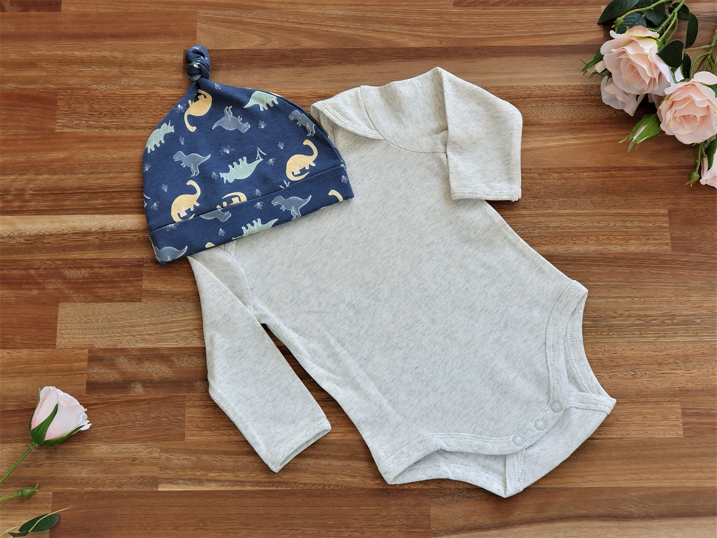 Dinosaur hat and beige romper