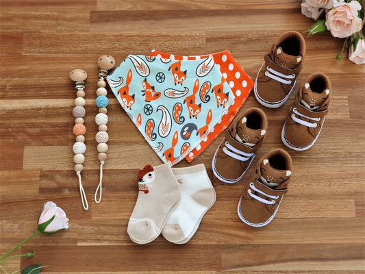 twin Fox gift box, fox boots, blue fox bandana bib, orange and white polka dot bandana bib, fox socks, beaded pacifier clip